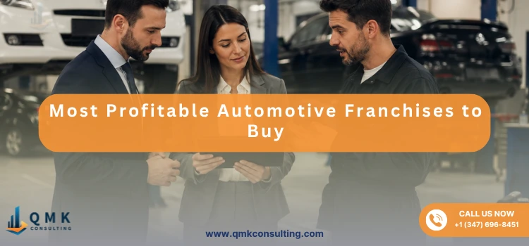 Business consultants and an automotive technician reviewing franchise operations inside a professional auto repair shop.